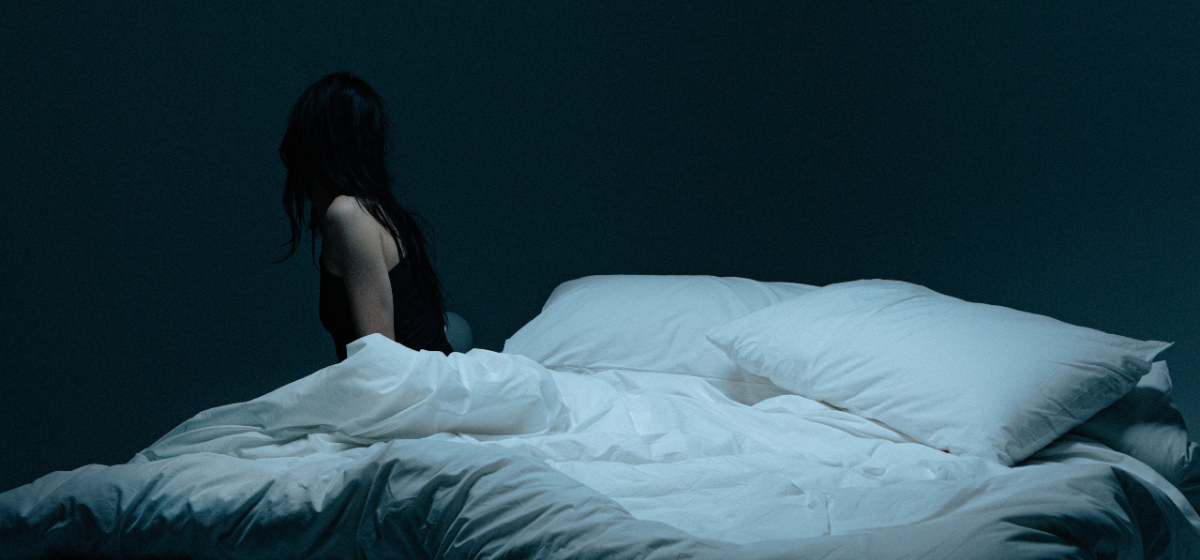 Perimenopause sleep struggle illustration showing night reflection and fatigue